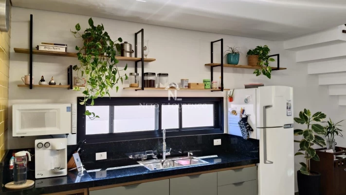 Foto 12: Casa Térrea com Mezanino no Condomínio Bella Vitta – Conforto e Sofisticação Integrados à Natureza